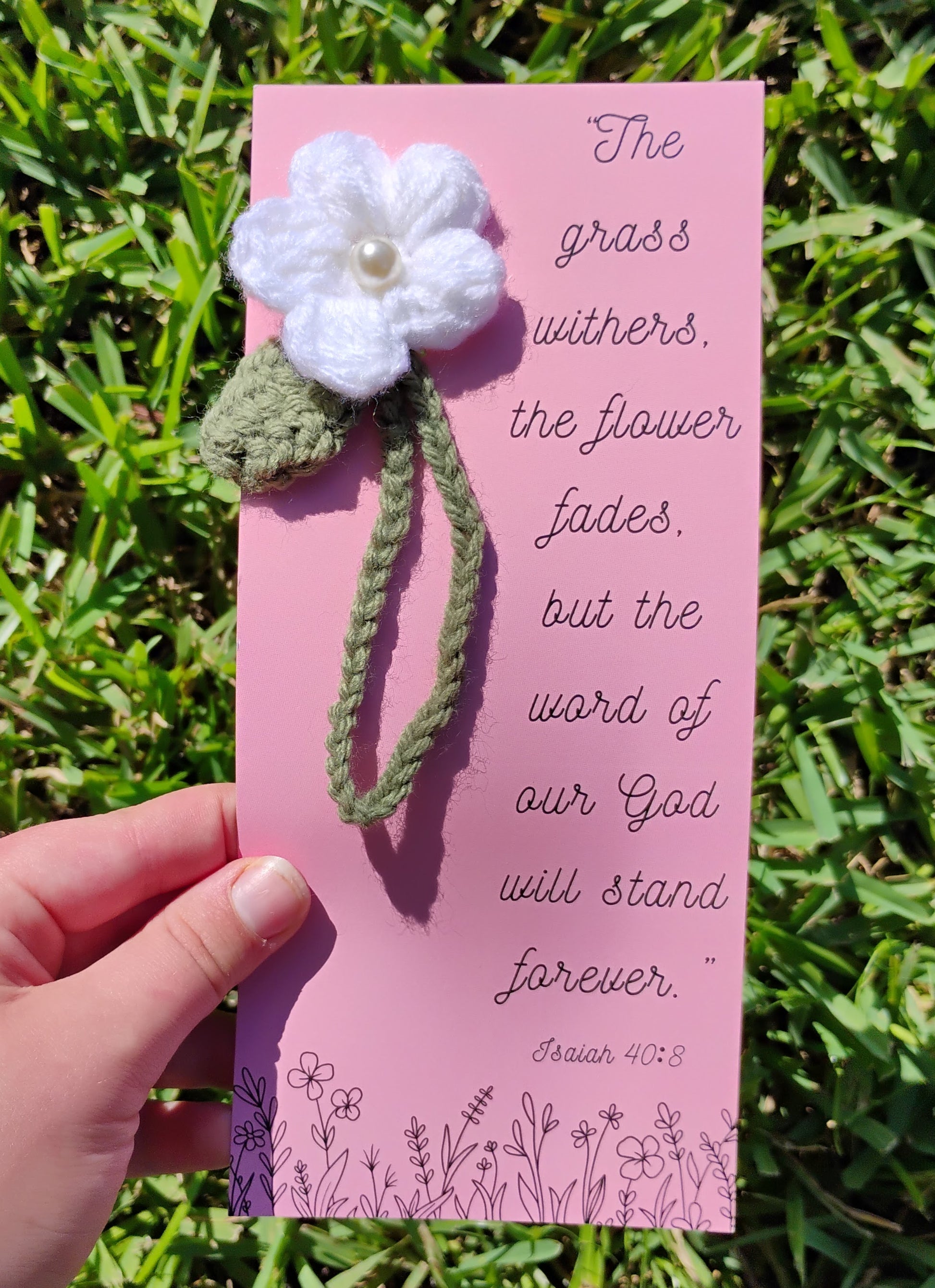 Pink card with crocheted white flower bookmark 